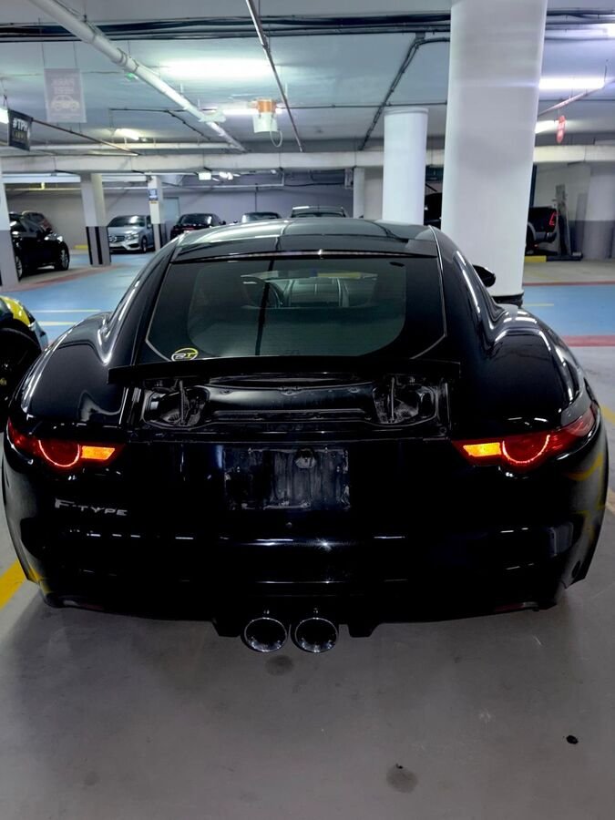 Jaguar F-Type black in Dubai parking