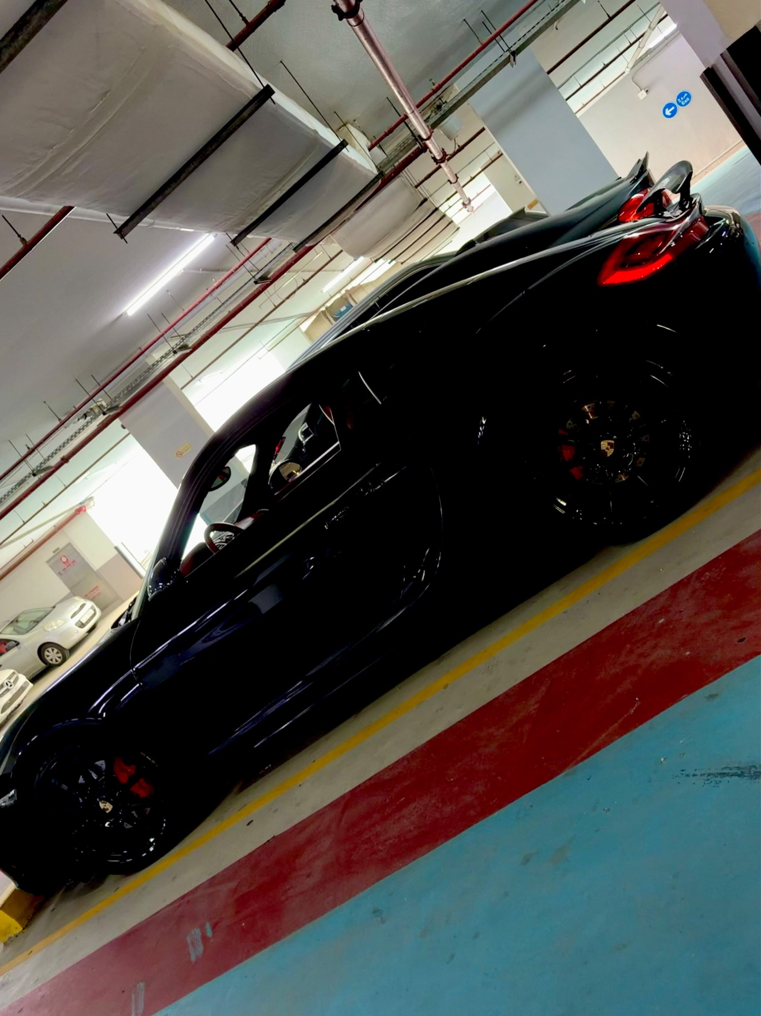 Porsche Cayman GTS black, rear view