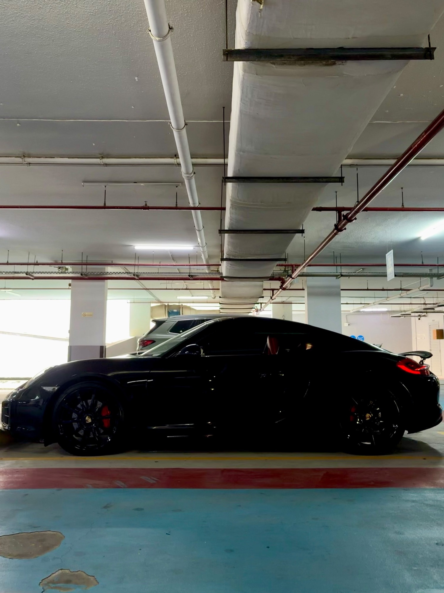 Porsche Cayman GTS black, side profile